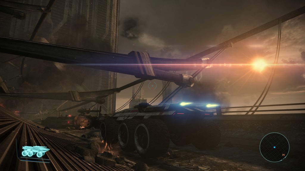 The Mako rover crossing a ruined bridge at sunset in Mass Effect Legendary Edition